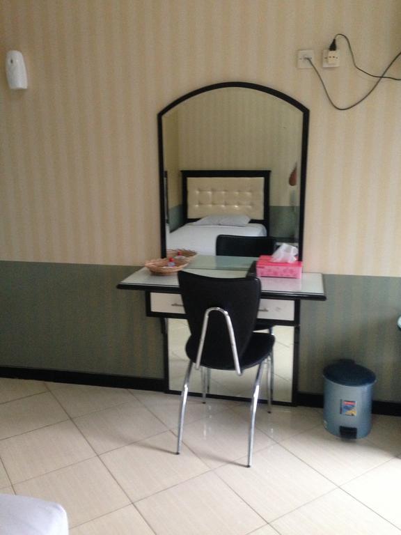 Global Inn Keluarga Sedati Номер фото