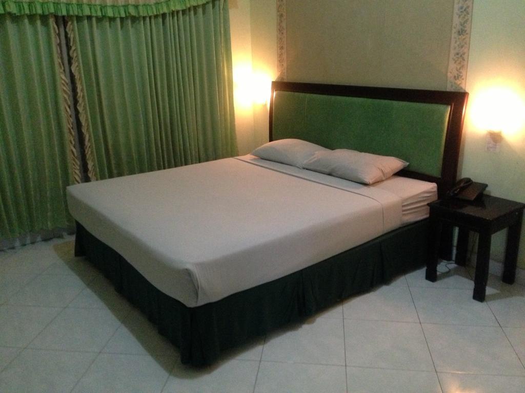 Global Inn Keluarga Sedati Номер фото